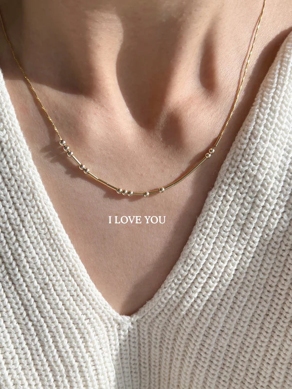 Collar en código Morse