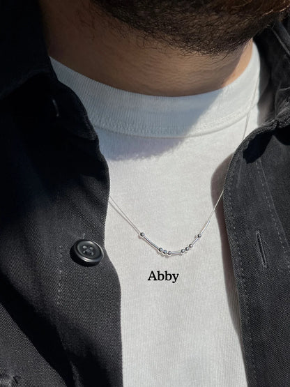 Collar en código Morse