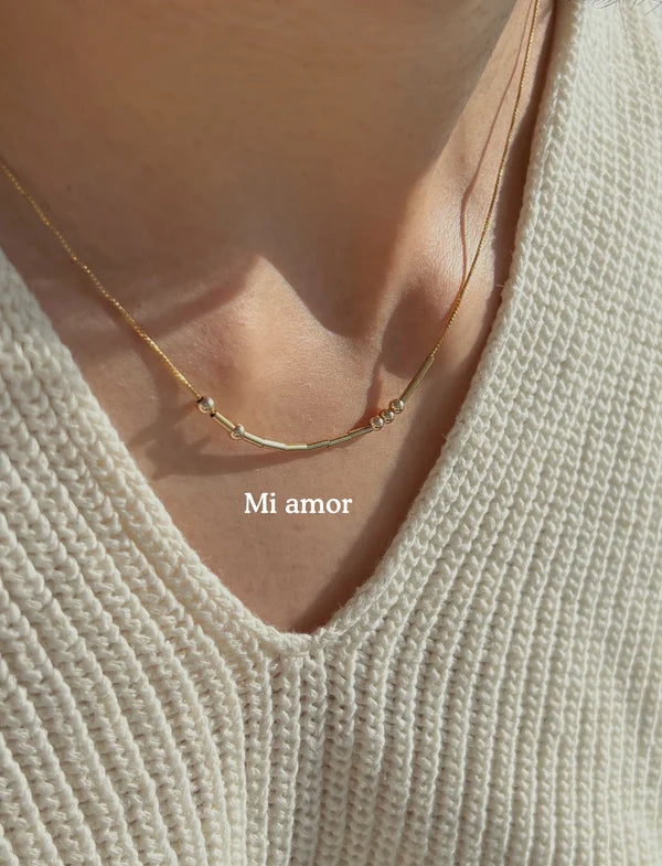Collar en código Morse